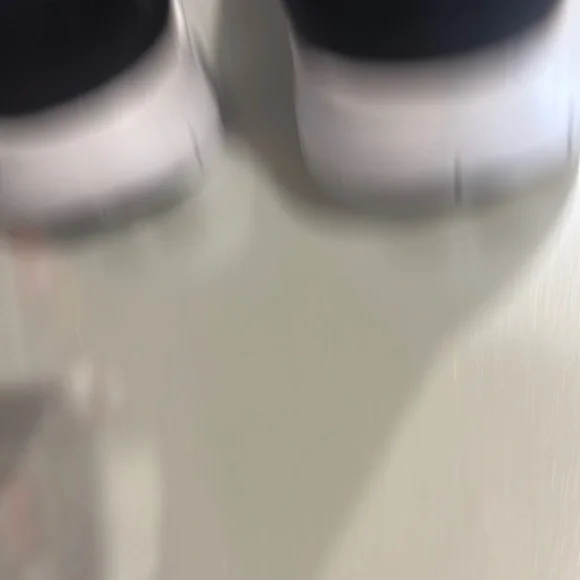 Nike Black and White Sneakers with Knit Upper and Sleek Design - Picture 3 of 5